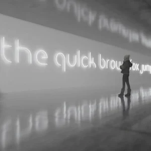 Artemide Alphabet of Light applique majuscule T^ Design